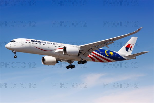 A Malaysia Airlines Airbus A350-900 with registration number 9M-MAF lands at London Heathrow Airport