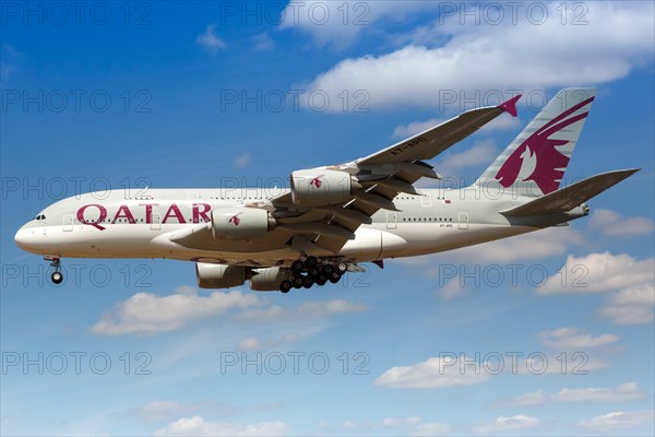 A Qatar Airways Airbus A380-800 with registration A7-APD lands at London Heathrow Airport