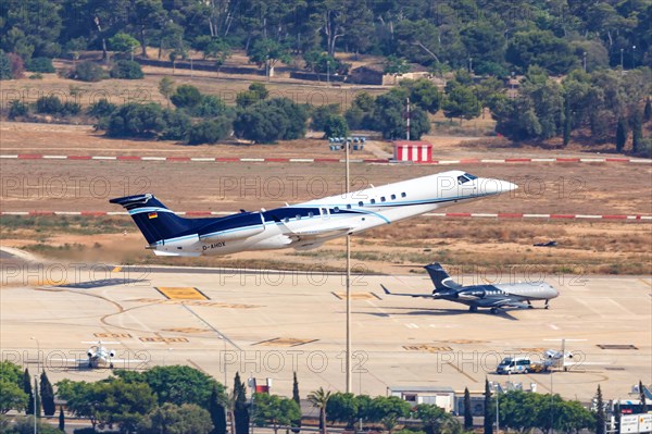 An Embraer ERJ-135BJ Legacy 650 aircraft of Air Hamburg with registration D-AHOX takes off from Palma de Majorca Airport