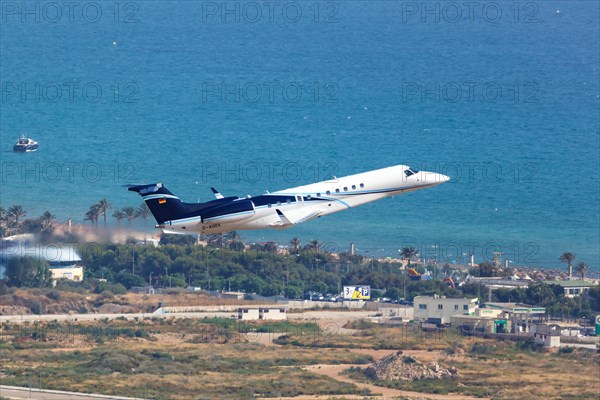 An Embraer ERJ-135BJ Legacy 650 aircraft of Air Hamburg with registration D-AHOX takes off from Palma de Majorca Airport