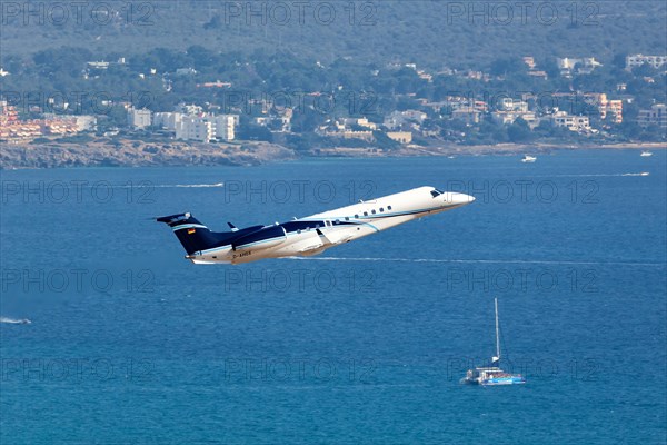 An Embraer ERJ-135BJ Legacy 650 aircraft of Air Hamburg with registration D-AHOX takes off from Palma de Majorca Airport