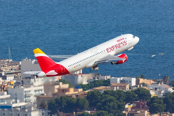 An Iberia Express Airbus A320 with the registration EC-LEA takes off from Palma de Majorca Airport