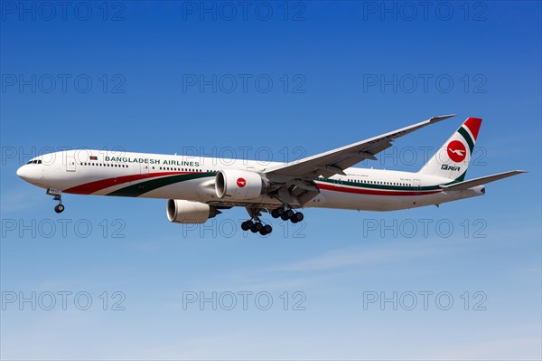 A Bangladesh Airlines Boeing 777-300ER aircraft with registration number S2-AFO lands at London Airport