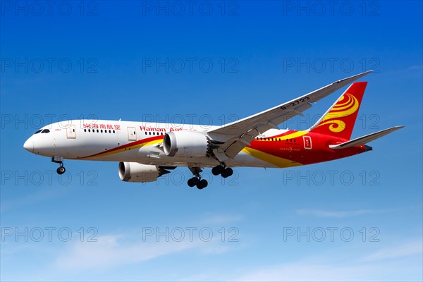 A Boeing 787-8 Dreamliner aircraft operated by Hainan Airlines with registration number B-2723 lands at London Airport
