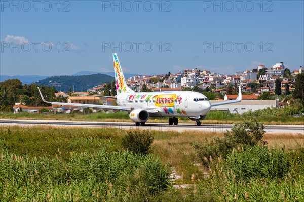 A Transavia Boeing 737-800 with the registration PH-HSD in the Sunweb special livery at Skiathos Airport