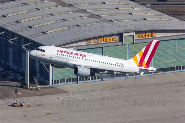 A Germanwings Airbus A319 with the registration D-AKNG takes off from Stuttgart airport