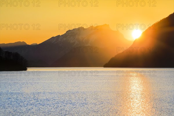 Lake with mountains in the background