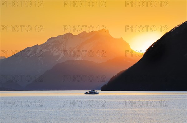 Lake with mountains in the background