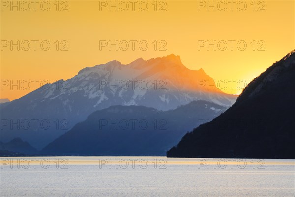 Lake with mountains in the background