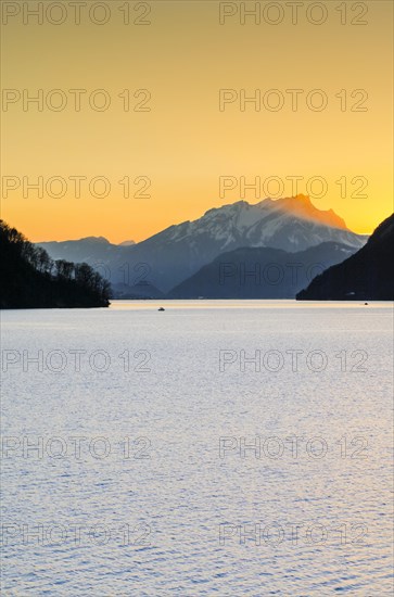 Lake with mountains in the background