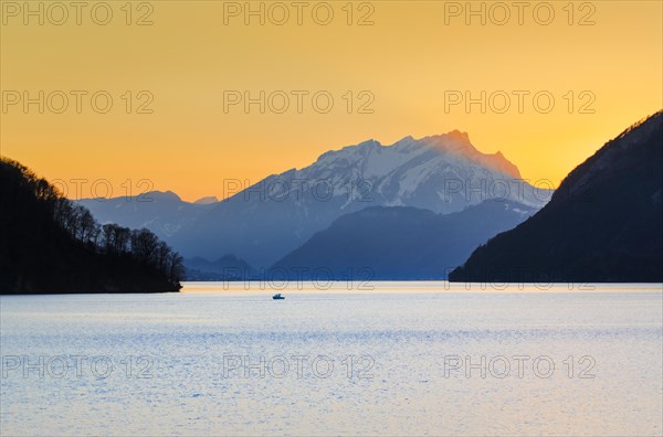 Lake with mountains in the background