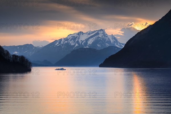 Lake with mountains in the background