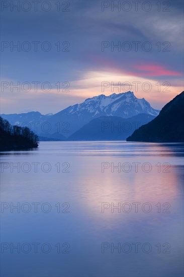 Lake with mountains in the background