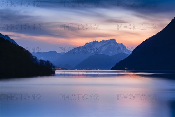 Lake with mountains in the background