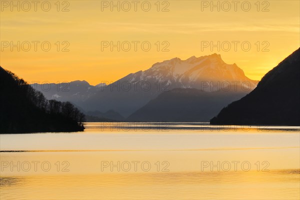 Lake with mountains in the background