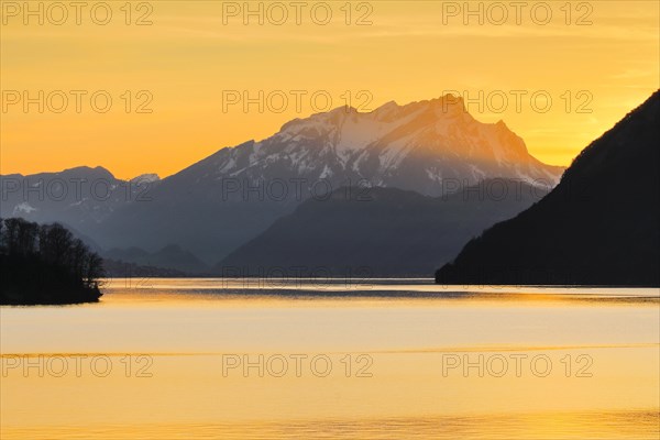 Lake with mountains in the background