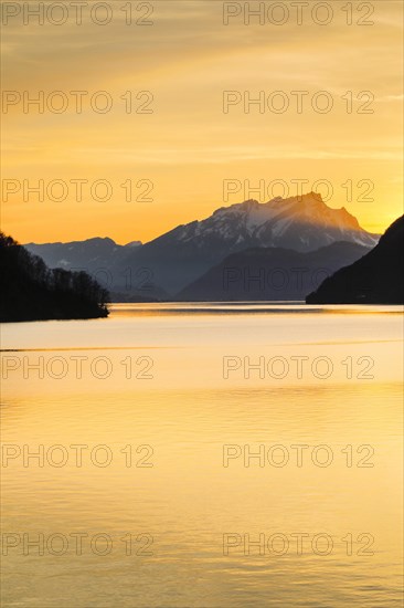 Lake with mountains in the background