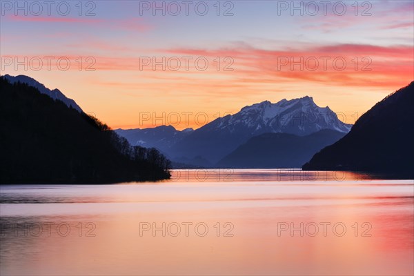 Lake with mountains in the background