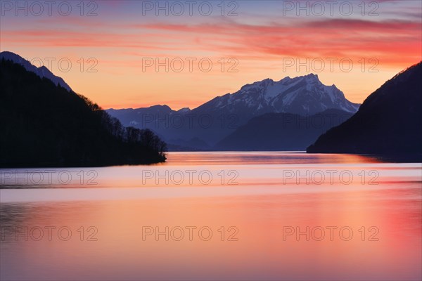 Lake with mountains in the background