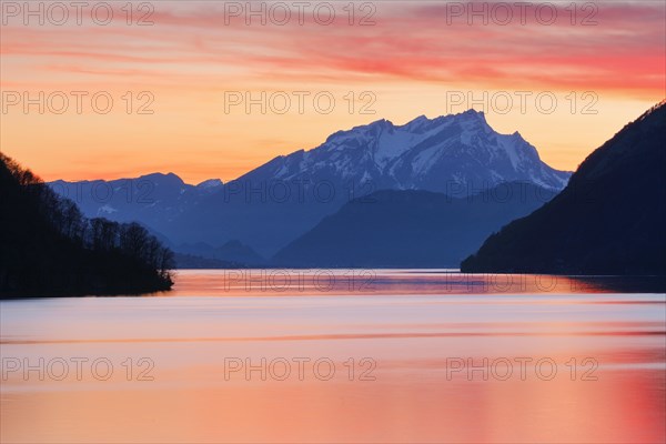 Lake with mountains in the background