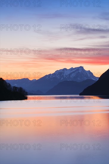 Lake with mountains in the background