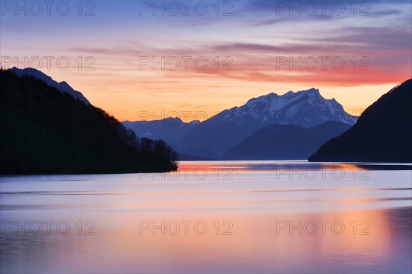 Lake with mountains in the background