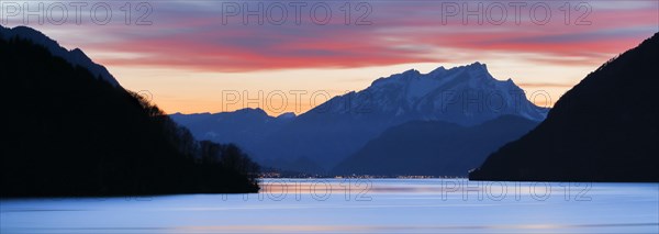 Lake with mountains in the background