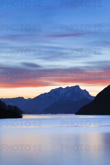 Lake with mountains in the background