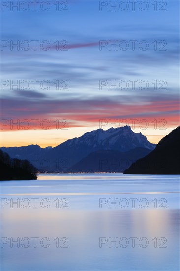 Lake with mountains in the background