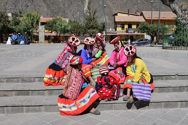 Indigenous woman in colorful costumes