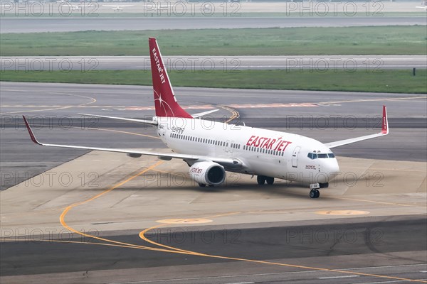 An Eastar Jet Boeing 737-800 with registration number HL8036 at Seoul Gimpo Airport