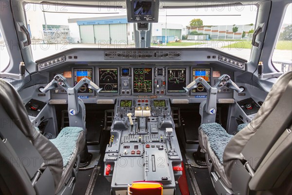 Cockpit of a German Airways Embraer 190 with registration D-AJHW at Cologne Airport