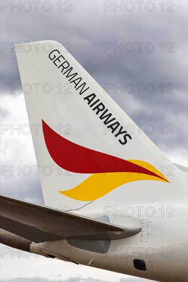 Rudder of a German Airways Embraer 190 with the registration D-AJHW at Cologne Airport