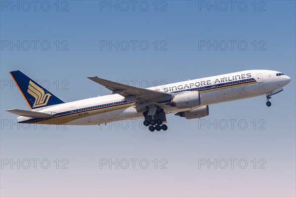 A Singapore Airlines Boeing 777-200ER aircraft with registration number 9V-SQL at Hong Kong Airport