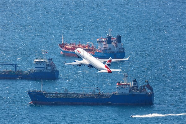 A British Airways Airbus A320 with the registration G-EUYS takes off from Gibraltar Airport