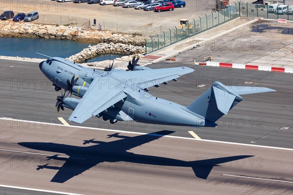 A Royal Air Force Airbus A400M with registration number ZM411 takes off from Gibraltar Airport