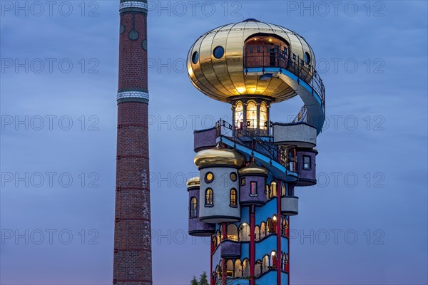 Kuchlbauer Tower or Hundertwasser Tower by Friedensreich Hundertwasser and Peter Pelican with chimney of the Kuchlbauer brewery