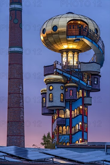 Kuchlbauer Tower or Hundertwasser Tower by Friedensreich Hundertwasser and Peter Pelican with chimney of the Kuchlbauer brewery