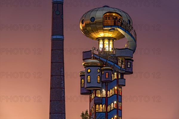 Kuchlbauer Tower or Hundertwasser Tower by Friedensreich Hundertwasser and Peter Pelican with chimney of the Kuchlbauer brewery