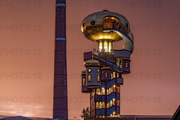 Kuchlbauer Tower or Hundertwasser Tower by Friedensreich Hundertwasser and Peter Pelican with chimney of the Kuchlbauer brewery