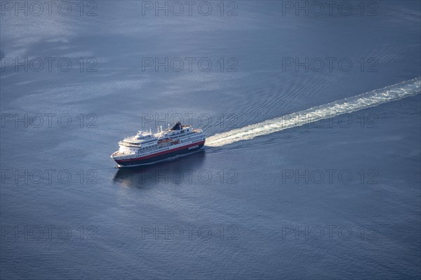 Hurtigruten boat sailing on Fjord Raftsund