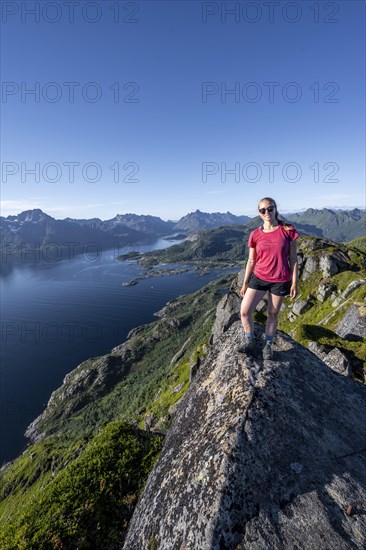Young hiker standing on rocks