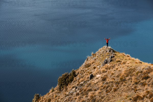 Guy on a mountain at Lake Hawea