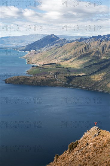 Guy on a mountain at Lake Hawea