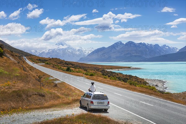 Guy on a car roof