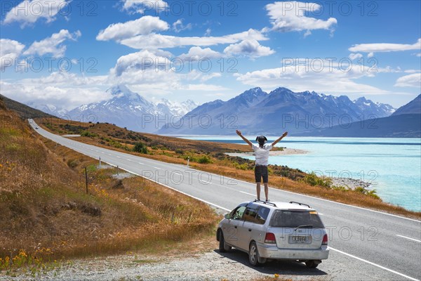 Guy on a car roof