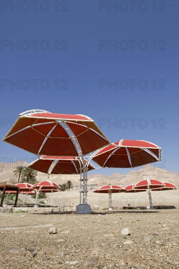 Abandoned parasols on the beach