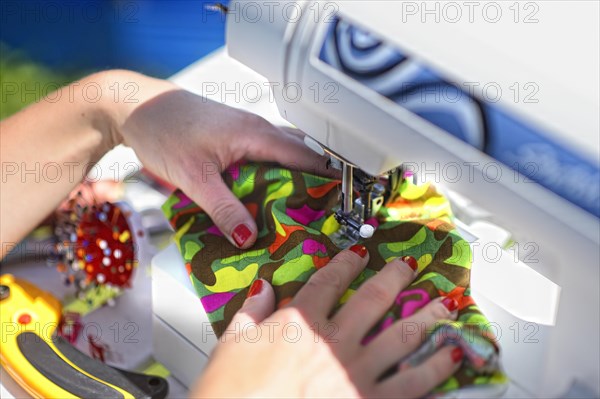 Dressmaker at the sewing machine