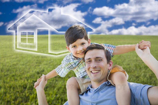 Excited mixed-race father and son piggyback over grass field