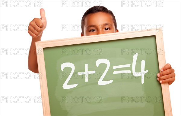 Proud hispanic boy holding chalkboard with math equation and thumbs up isolated on a white background